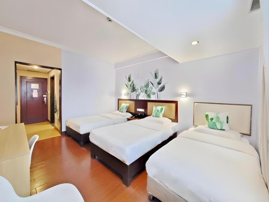 גואנגג'ואו Wings Hotel מראה חיצוני תמונה