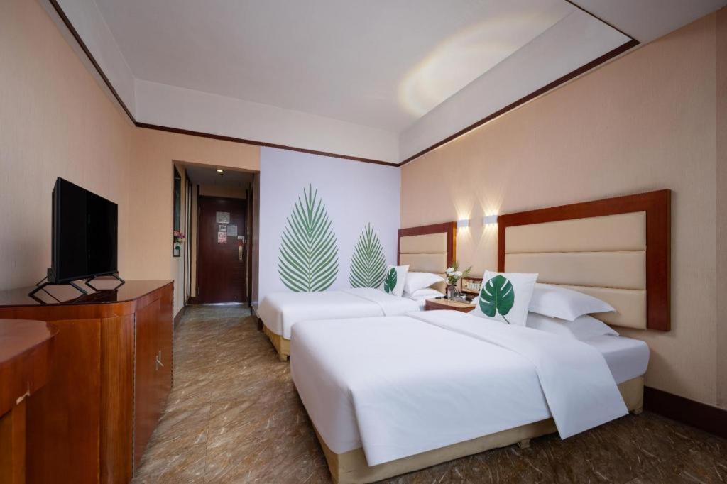 גואנגג'ואו Wings Hotel מראה חיצוני תמונה