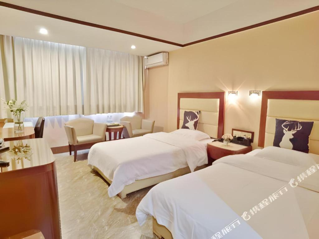 גואנגג'ואו Wings Hotel מראה חיצוני תמונה