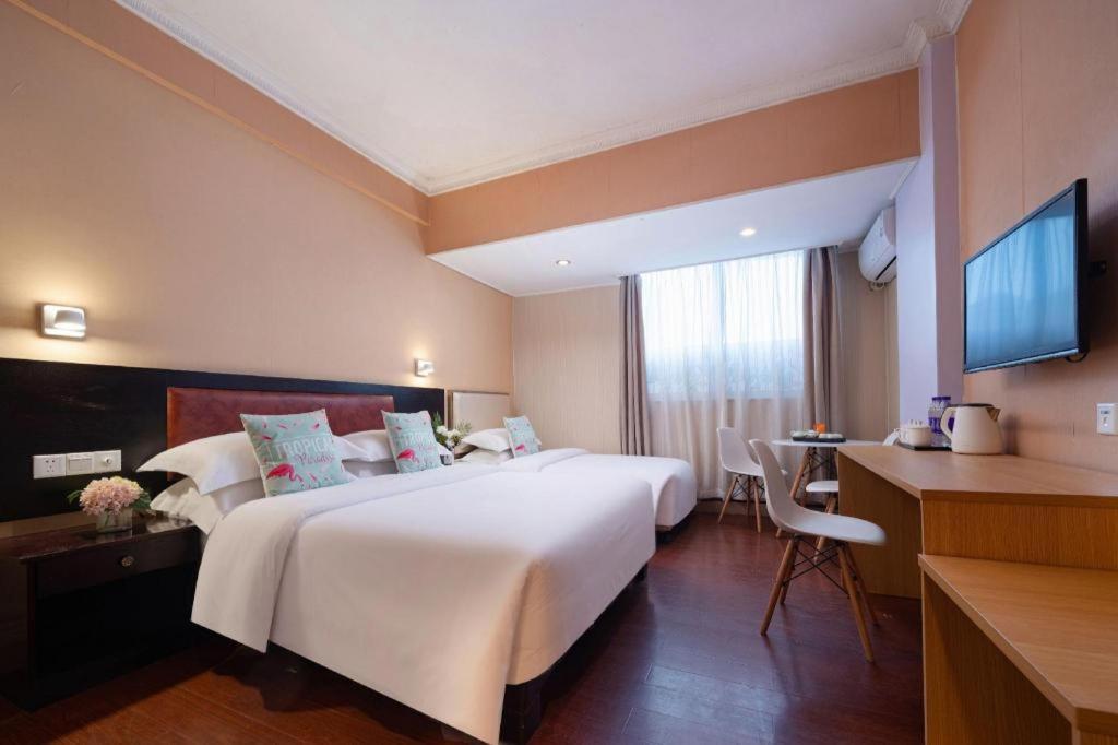 גואנגג'ואו Wings Hotel מראה חיצוני תמונה