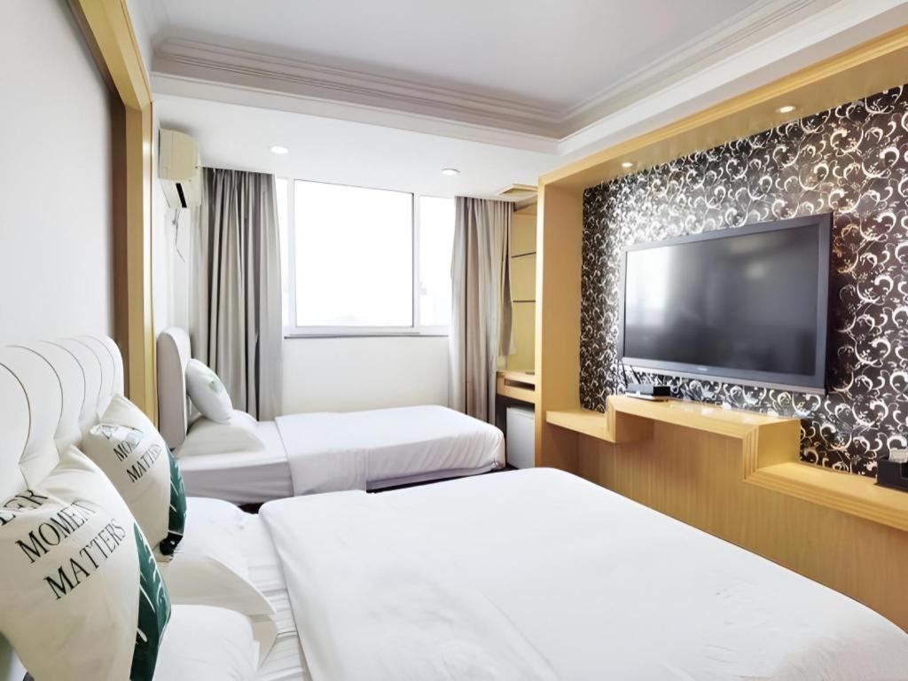 גואנגג'ואו Wings Hotel מראה חיצוני תמונה
