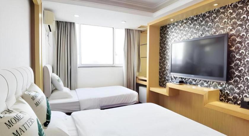 גואנגג'ואו Wings Hotel מראה חיצוני תמונה
