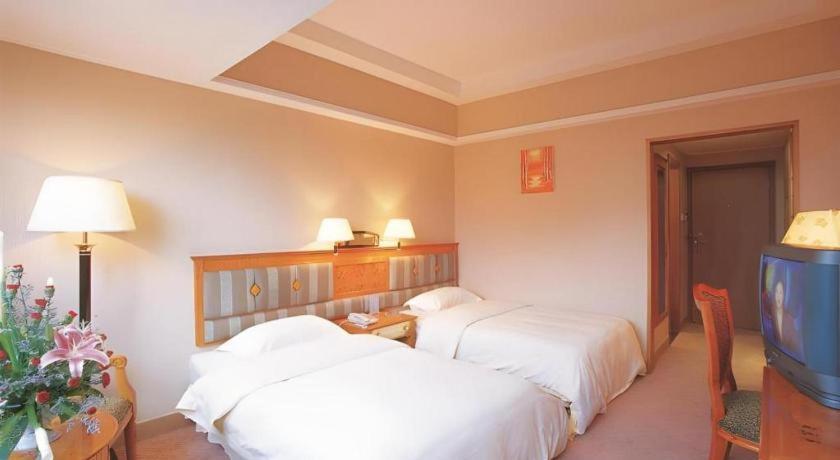 גואנגג'ואו Wings Hotel מראה חיצוני תמונה